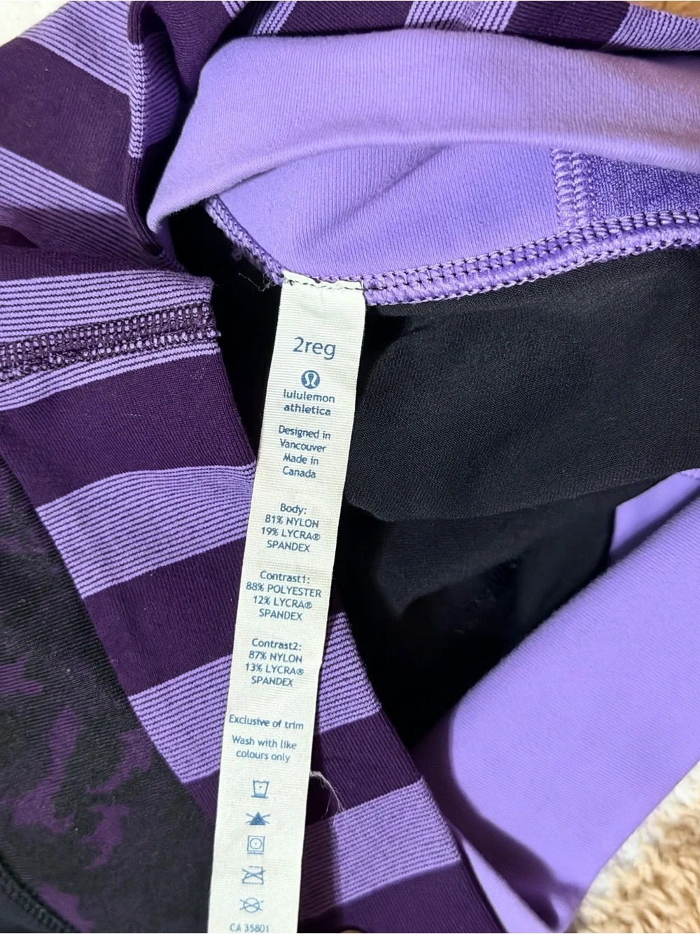 Lululemon Women’s Flare Leggings with Purple Waistband